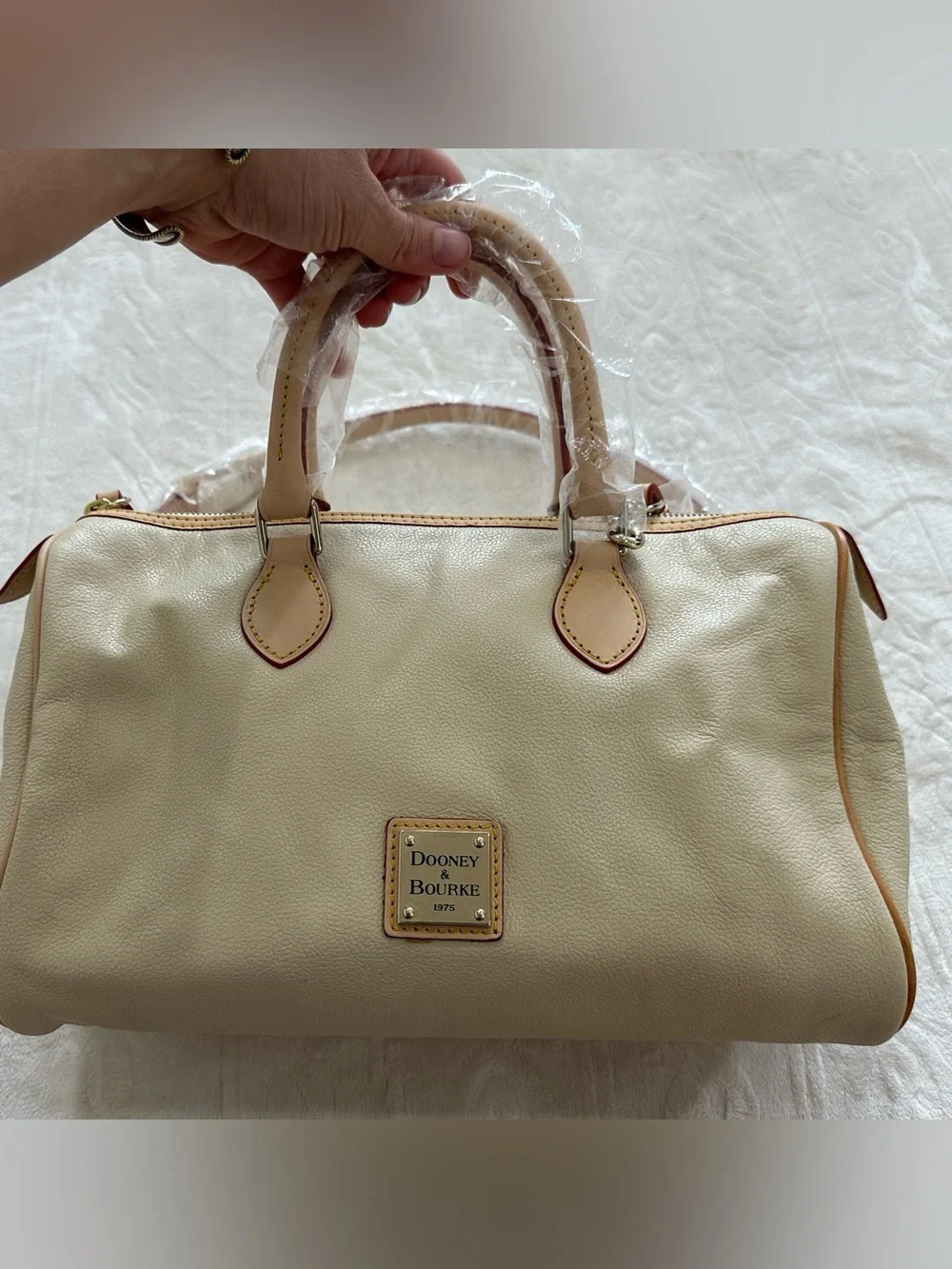 Dooney & Bourke Cream Leather Satchel with Tan Trim and Navy Tag Accent